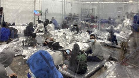 biden kids in metal boxes|Child migrants: First photos emerge of Biden.